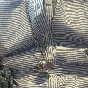Silver Ball Pendant Necklace on trend this summer